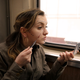 Image for article titled Harried Woman On Train Quickly Doing Plastic Surgery On Face Before Work